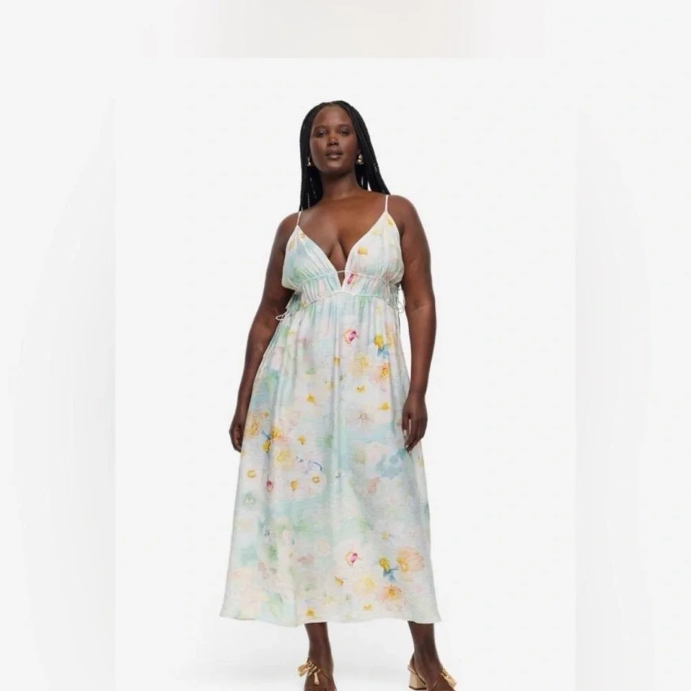 plus size pastel floral dress Plus Size Cool Crepe Floral Flutter Sleeve Wrap Midi Dress
